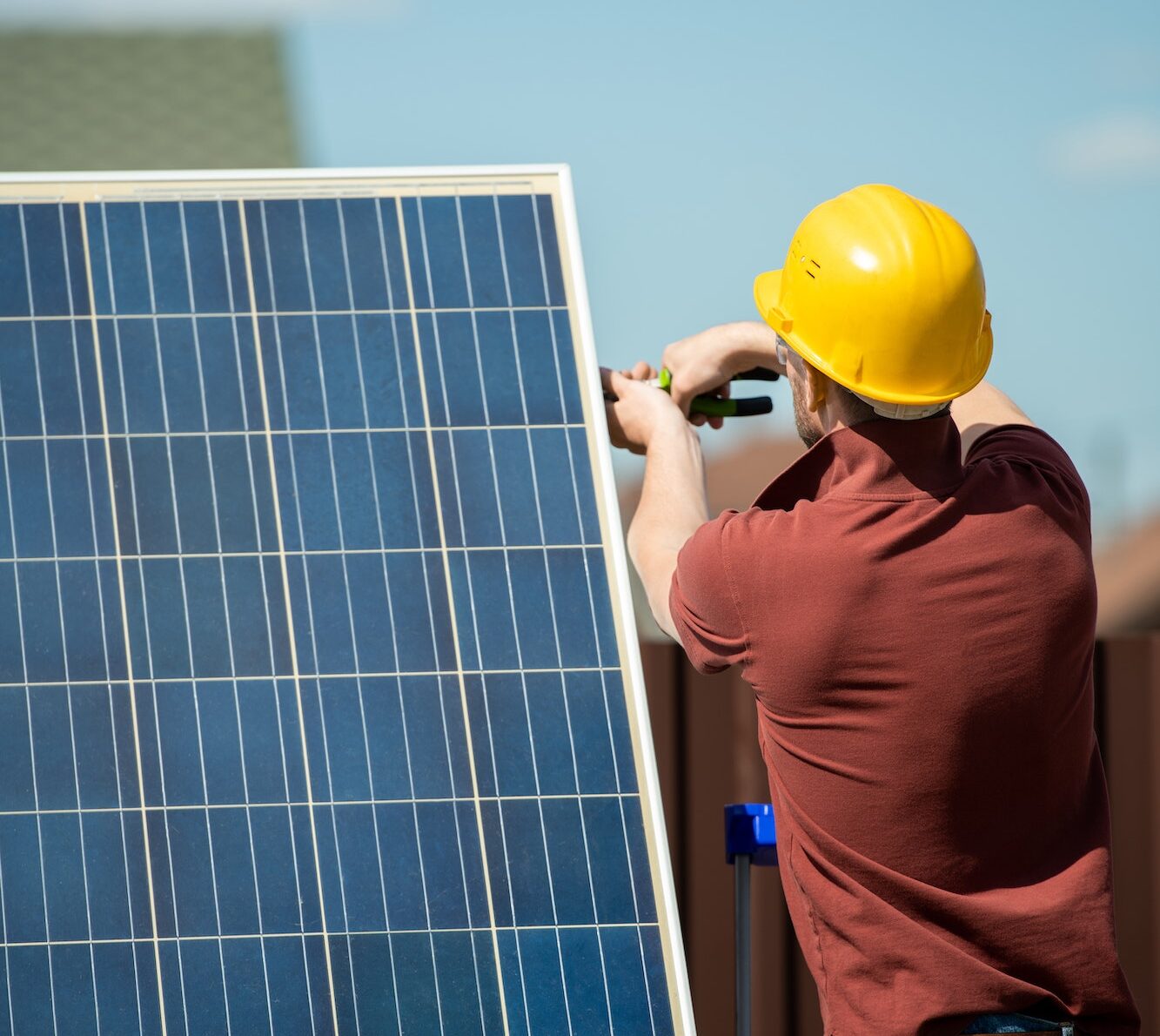 Worker Installing Photovoltaic Panel